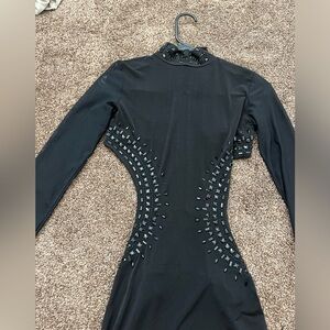 Kikiriki ball length gown with side cut outs. New with tags.